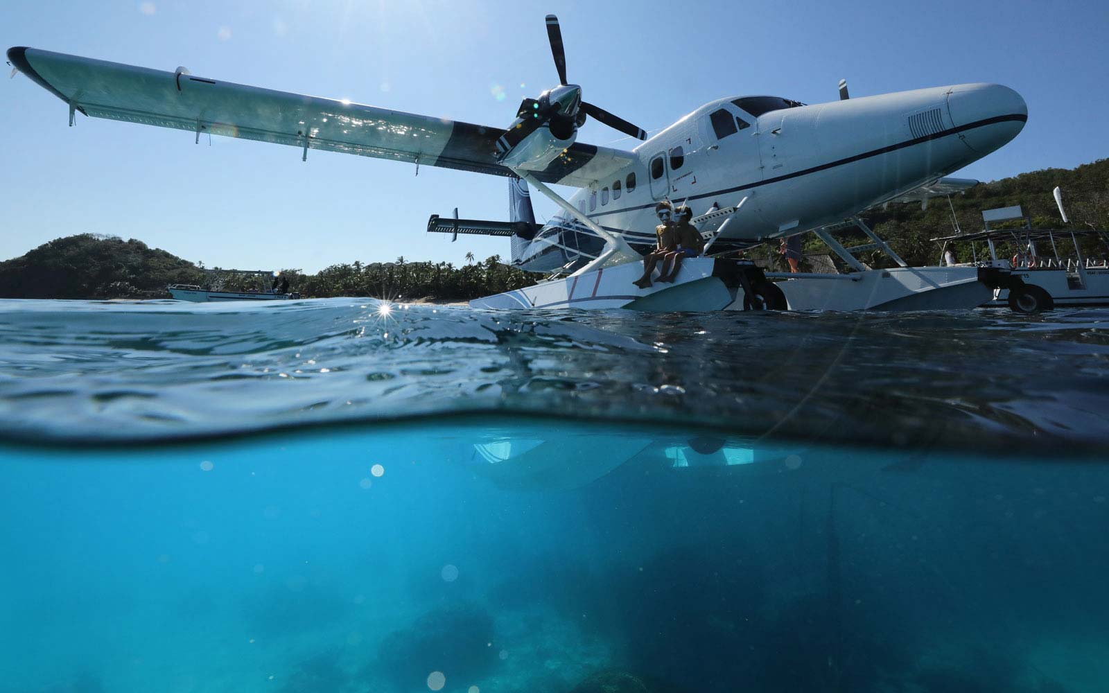 Seaplane on bright blue water